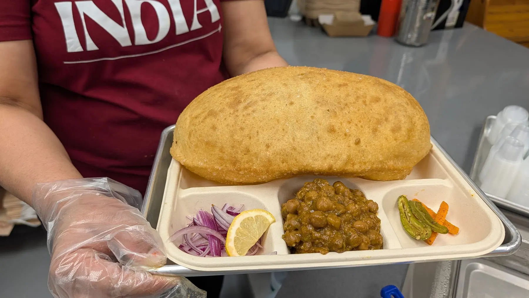 Chole bhature served on a tray at Sitara